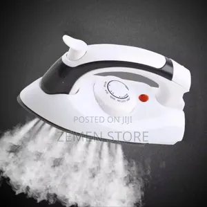 Photo - Compact Handheld Steam Iron