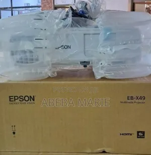 Photo - Brand New EPSON Projector With Manual CD And