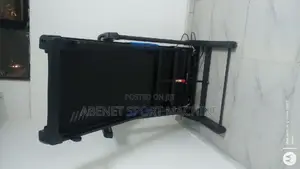 Photo - Reebok መሮጫ ማሽን