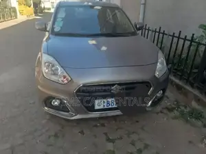 Photo - Suzuki Dzire 2021 Silver