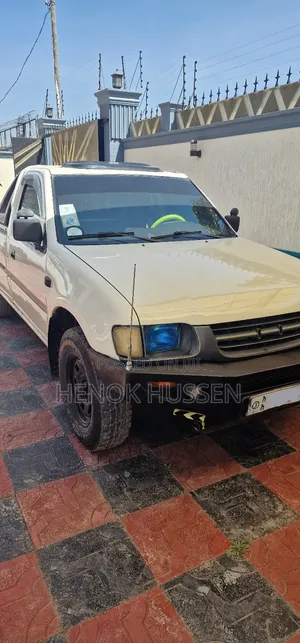 Photo - Isuzu KB 1999 White