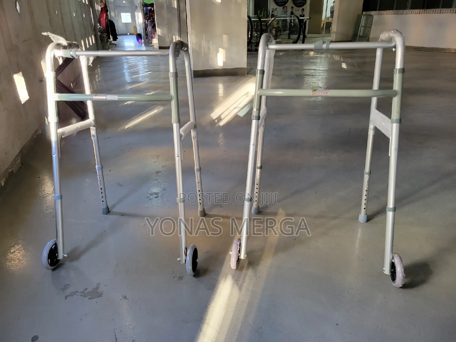 Aluminum Folding Walker 5"Wheels 300 Lb Adj Height 32"38.5"