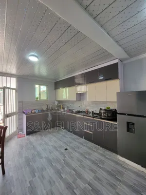 Photo - Glossy Kitchen Island Priced Per Square Meter