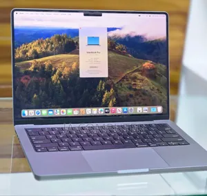 Photo - New Apple MacBook Pro 2023 M3 14-Inch 16GB Apple M3 Pro SSD 512GB