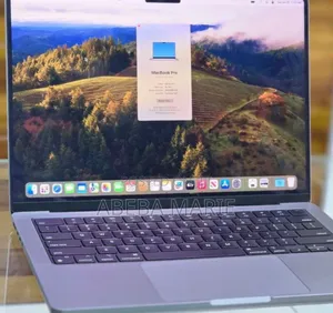 Photo - New Apple MacBook Pro 2023 M3 14-Inch 16GB Apple M3 Pro SSD 512GB