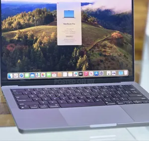 Photo - New Apple MacBook Pro 2023 M3 14-Inch 16GB Apple M3 Pro SSD 512GB