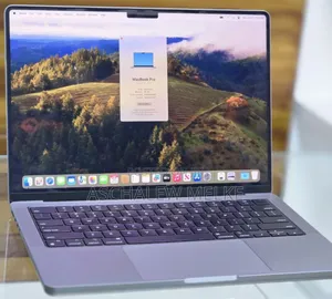 Photo - New Apple MacBook Pro 2023 M3 14-Inch 16GB Apple M3 Pro SSD 512GB