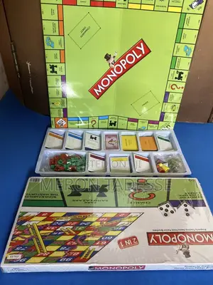 Photo - ሞኖፓሊ ጨዋታ | Monopoly Game | Get Double the Fun- 2-in-1game!
