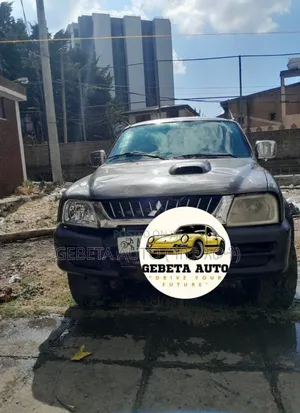 Photo - Mitsubishi L200 2005 Silver