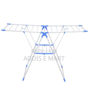 ቦታ ቆጣቢና በቀላሉ የሚተጣጠፉ 4 Wings Foldable Clothes Drying Rack