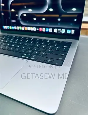 Photo - New Apple MacBook Pro 2023 M3 14-Inch 18GB Apple M3 Pro SSD 512GB