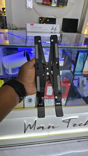Photo - Al Foldable Laptop Stand