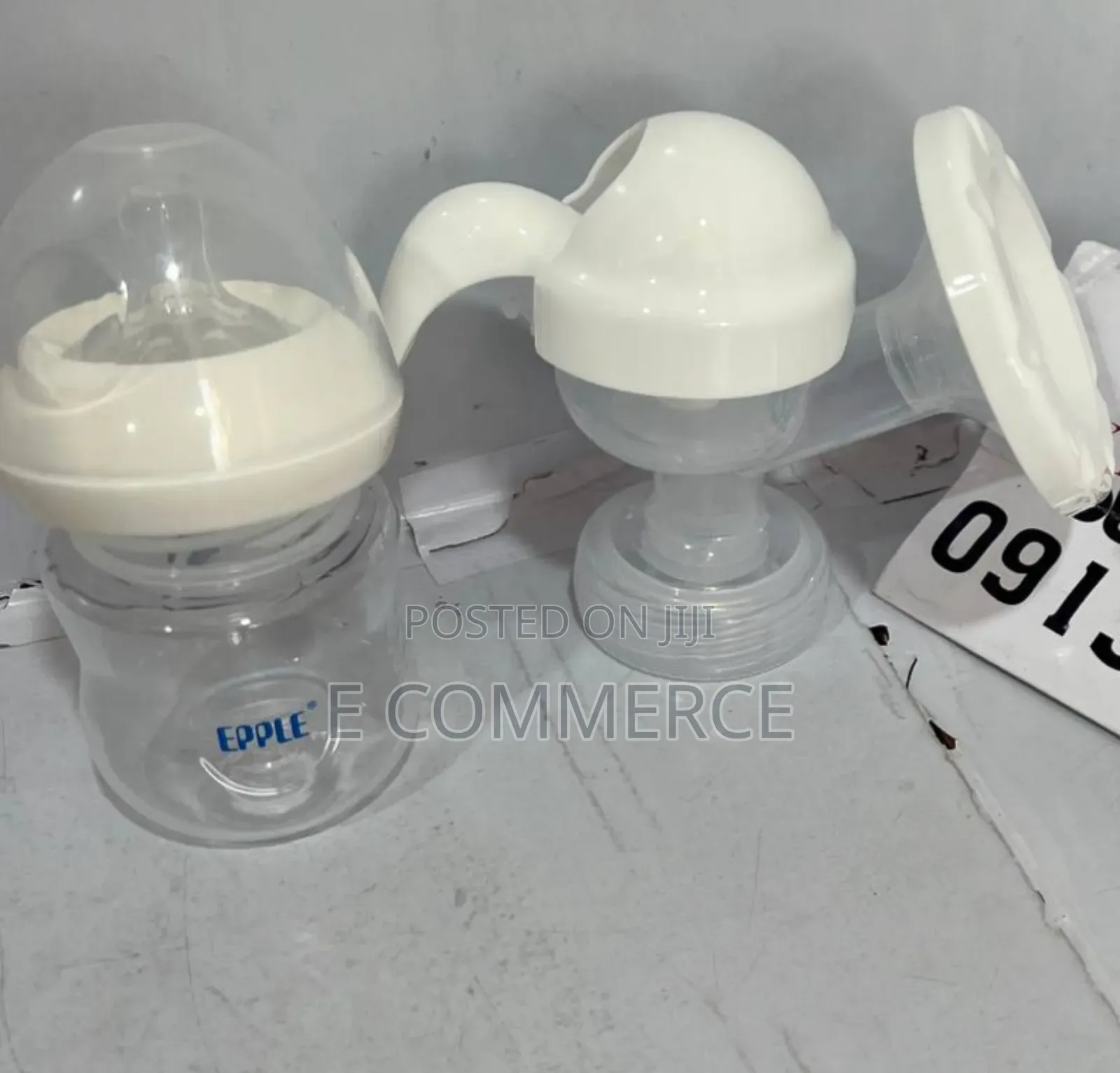 1ማንዋል የጡት ማለብያ ከተቀያሪ የጡጦ ጫፍ ጋር