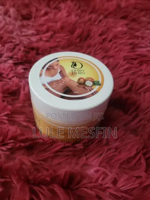 Photo - Dhin (ቆዳ እና ፊቷ የሚያቀላ)