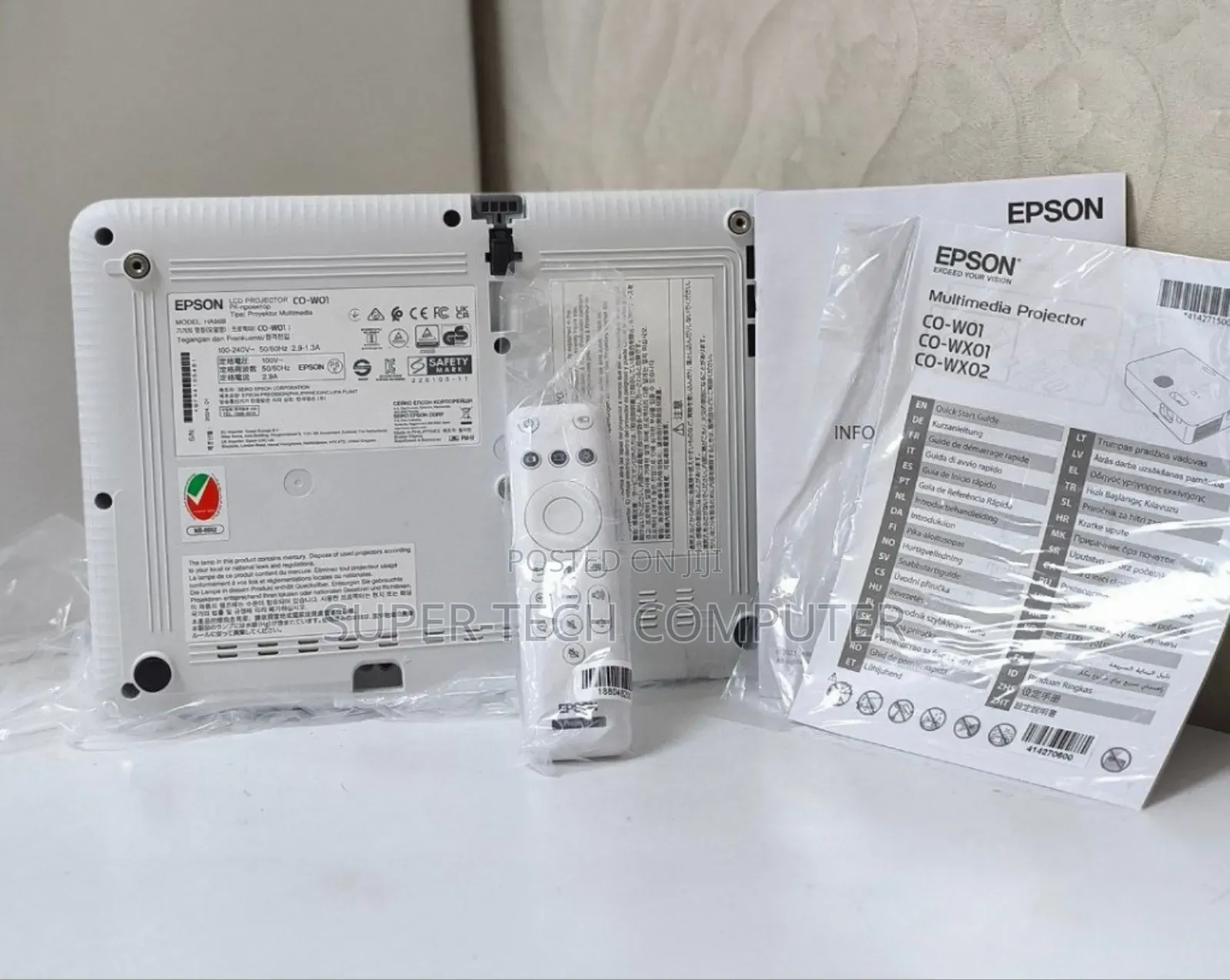 Brand New Epson W01 With Manual and Remote