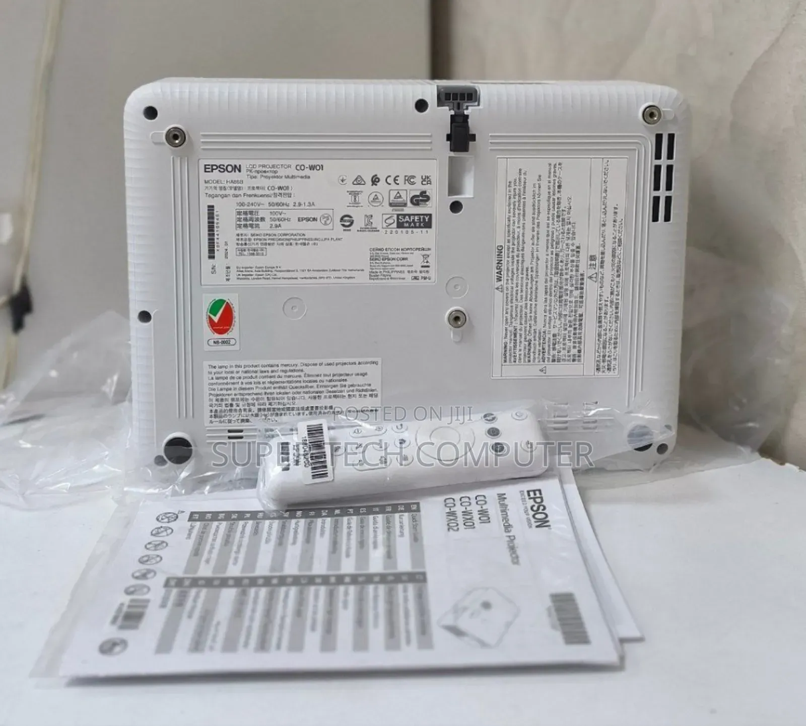 Brand New Epson W01 With Manual and Remote