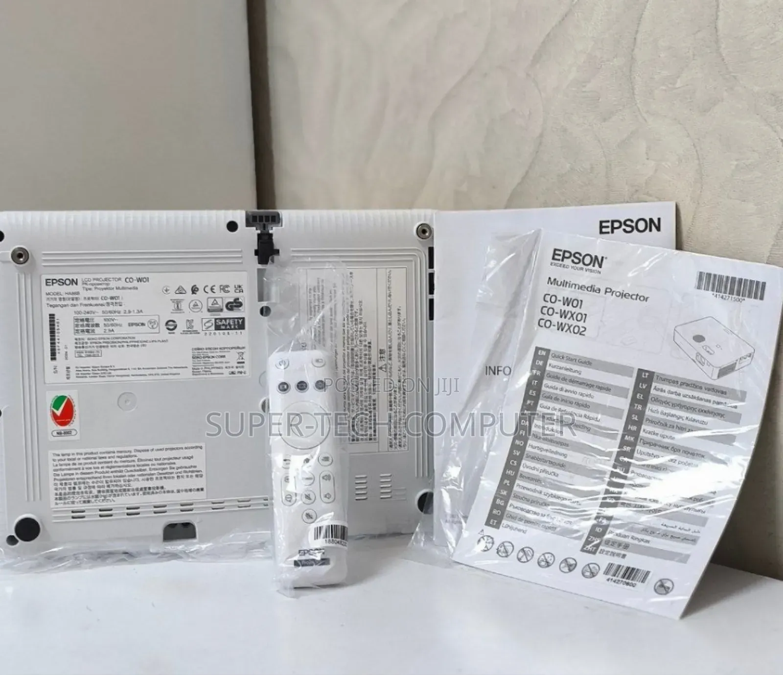Brand New Epson W01 With Manual and Remote