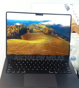 Photo - New Apple MacBook Pro 2023 M3 14-Inch 18GB Apple M3 Pro SSD 512GB