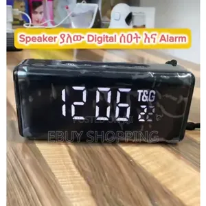 Versatile Wireless Speaker: Music, Alarm, Temperature, and Radio