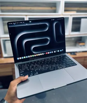 Photo - New Apple MacBook Pro 2023 M3 14-Inch 18GB Apple M3 Pro SSD 512GB