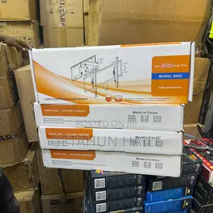 Photo - Tv Wall Mount (ቲቪ መስቀያ) Flexible Stand