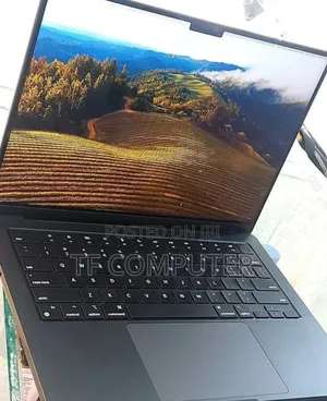 Photo - New Apple MacBook Pro 2023 M3 14-Inch 18GB Apple M3 Pro SSD 512GB