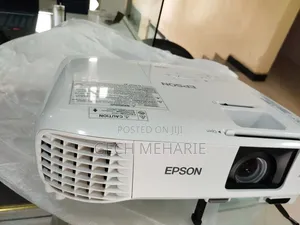 Brand New EPSON Projector
With Manual CD and Car