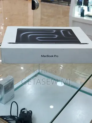 Photo - New Apple MacBook Pro 2023 M3 14-Inch 18GB Apple M3 Pro SSD 512GB