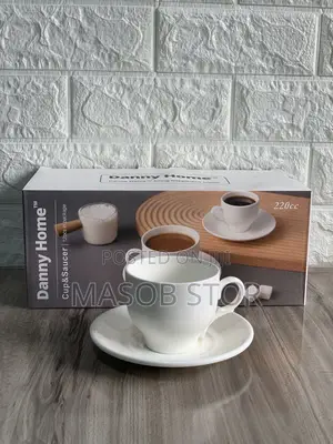 Photo - ዳኒ ሆን የሻይ እና የወተት ሲኒ