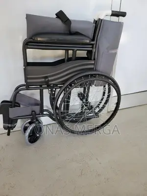 Photo - Portable Wheelchair Folds to a Compact Width፪留wheelchair
