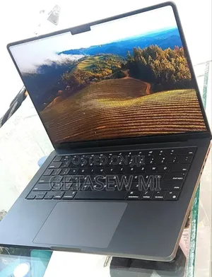 Photo - New Apple MacBook Pro 2023 M3 14-Inch 18GB Apple M3 Pro SSD 512GB