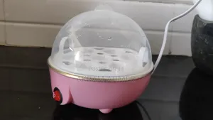 Multi Purpose Egg Poacher And Bottle Steamer