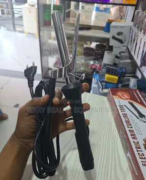 Photo - Electric Hair Curling Tong - ፀጉር ፐብሊስ መስሪያ