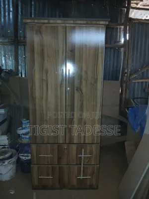 Photo - አካፋይ ያለው ላምኔት ቁም ሳጥን 80cm ፅድት ተደርጎ የተሠራ