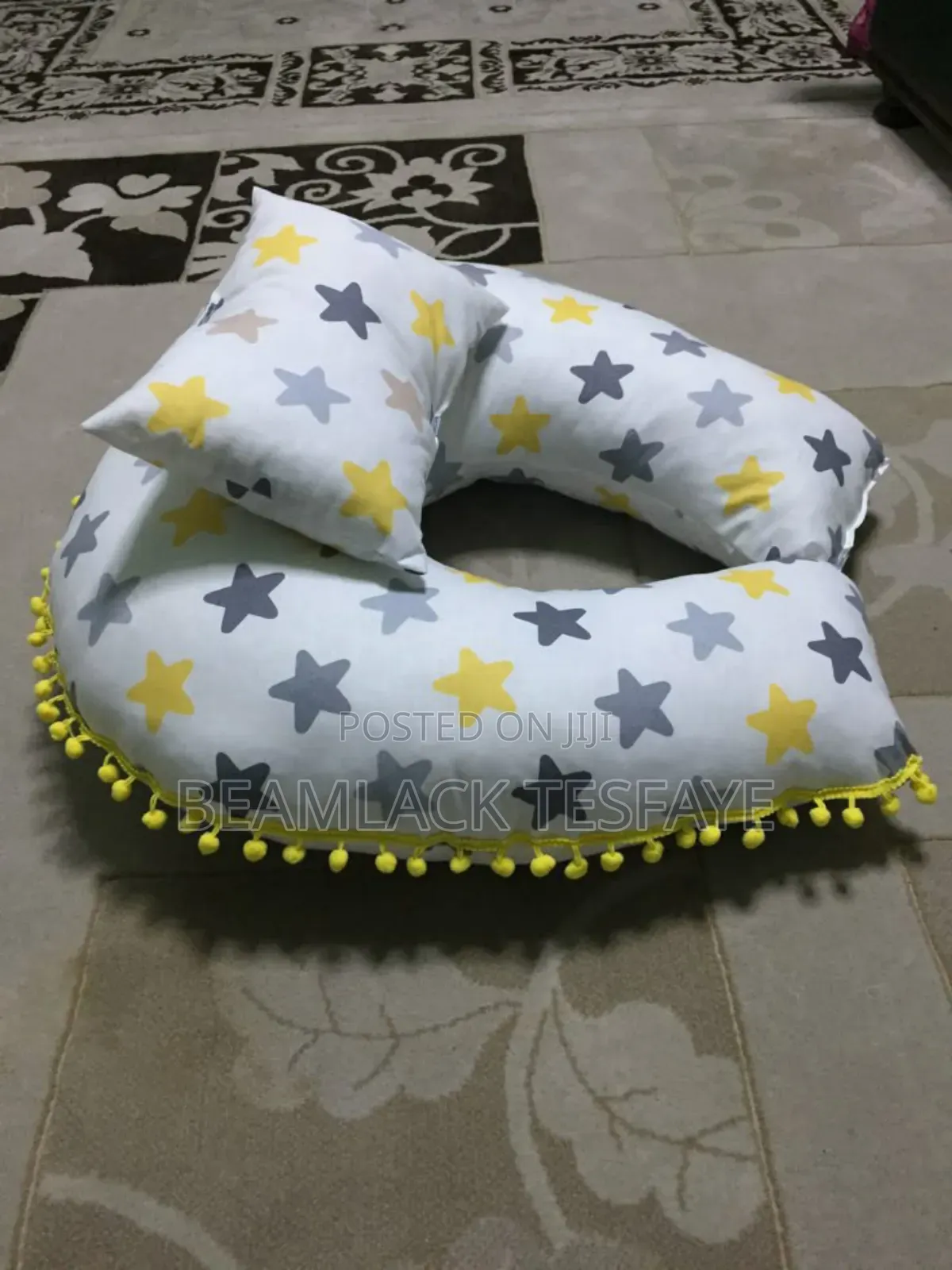 የማጥቢያ ደንገል Feeding Pillow