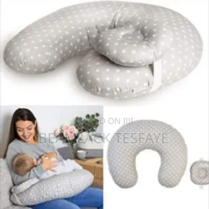 የማጥቢያ ደንገል Feeding Pillow