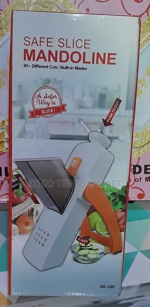 Photo - Multifunctional Vegetable Cutter( Safe Mandoline Slicer)