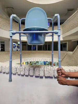 Photo - Bath Toilet Commode Chair卬፯carex 3-in-1folding Bedside Chair