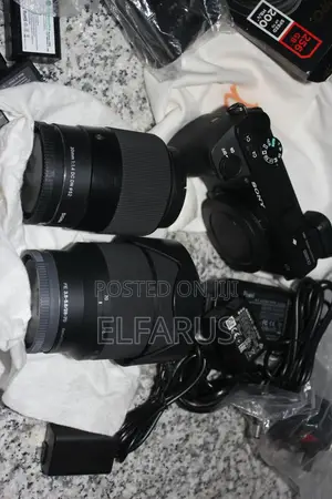 Sony Alpha A6500 + 1.4f Sigma + Sony 28-70mm + 4 Batteries