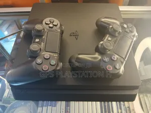 Photo - Ps 4 Slim Model 6 Month Warranty GPS Playstation