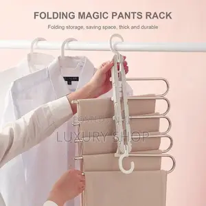 Photo - Hanglite 5-in-1 Trouser Hanger የሱሪ ማስቀመጫ