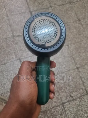 Photo - Rechargeable Clothes Lint Remover