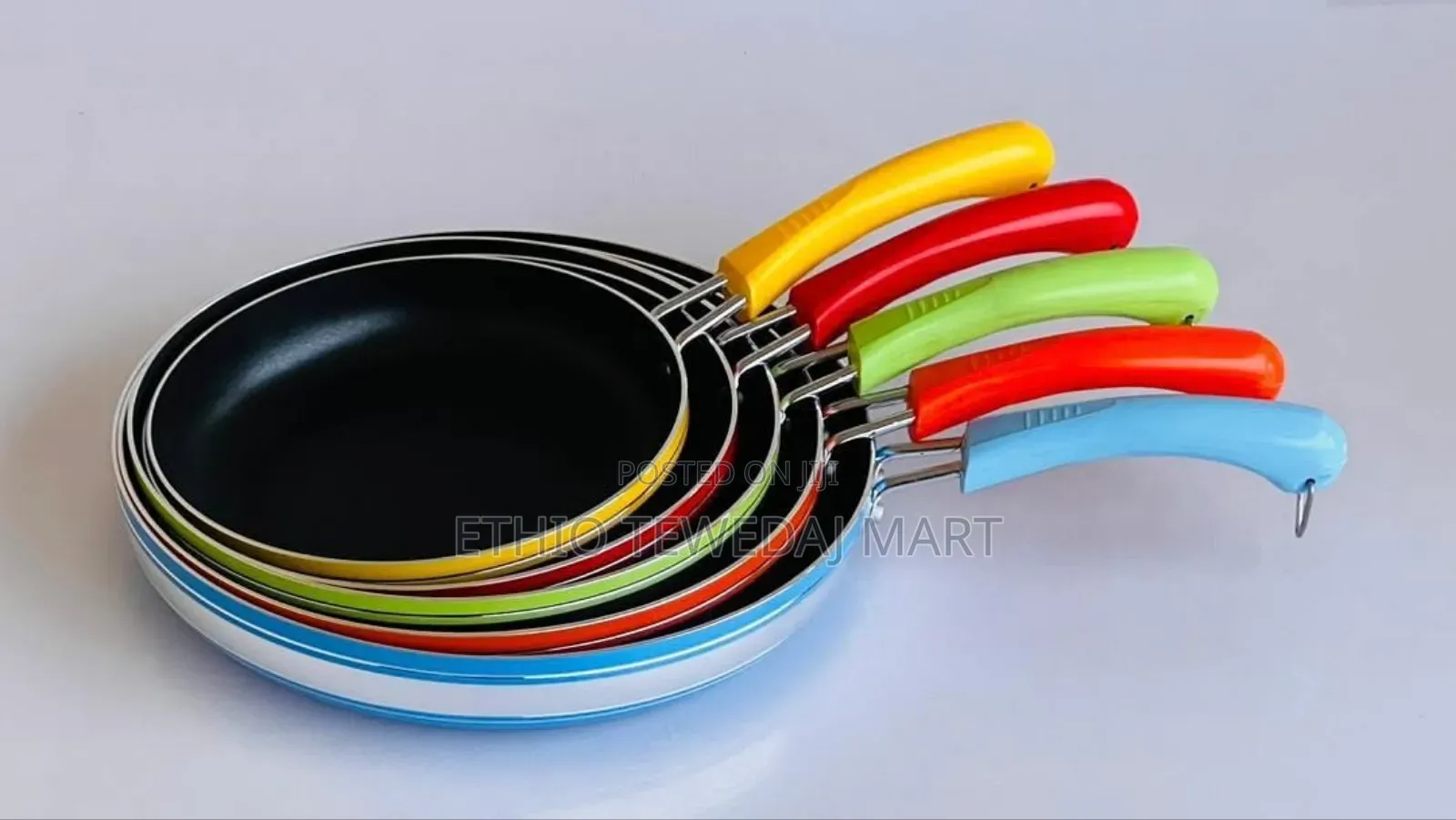 Five Nonstick Frying Pans With Colorful Handles. መጥበሻ