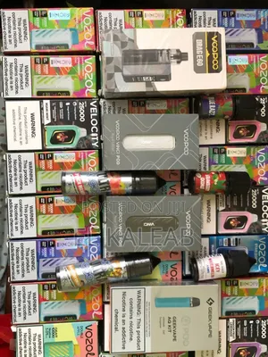 Photo - Refillable and Disposable Vapes and Juices in Variety