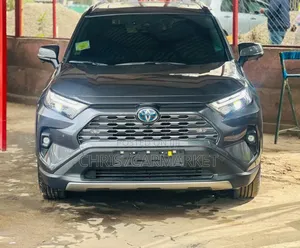 Photo - New Toyota RAV4 LE AWD 2023 Gray