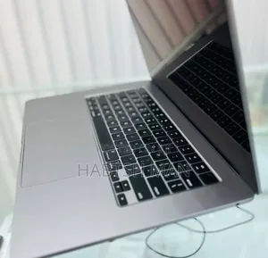 Photo - New Apple MacBook Air 2024 M3 15-Inch 8GB Intel Core M3 SSD 256GB