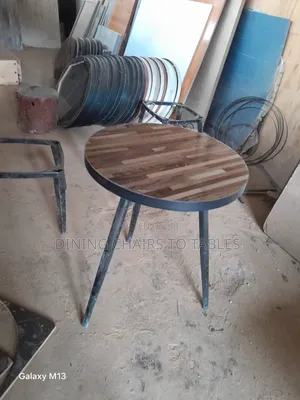 Photo - Dining Table With Metal Legs and MDF