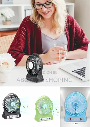 Photo - Ultra-Portable Mini Rechargeable Fan With Led Light