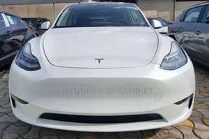 Photo - New Tesla Model Y 2024 White