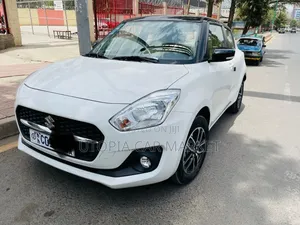Photo - Suzuki Swift 2021 White